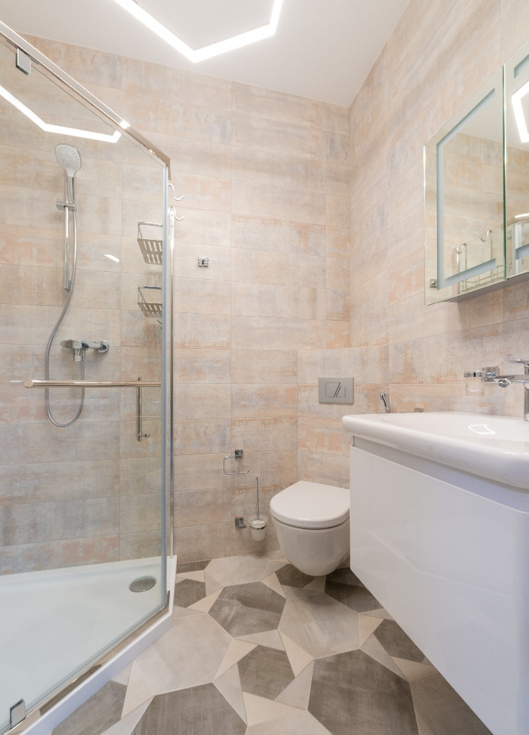 A ceramic sink near the shower